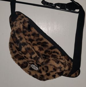 Petals and peacocks fanny pack